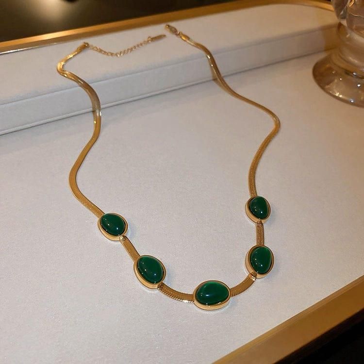 Radiant Beauty: Oval Green Crystal Pendant Necklace & Bracelet Set